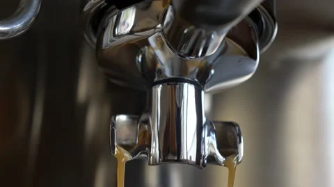 Professional Espresso Machine Pouring Coffee into China Porcelain Cup Stock Footage 166338648