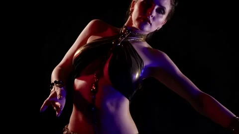 Professional exotic dancer lady is moving her sexy body, dressed exotic oriental Stock Footage 151470264
