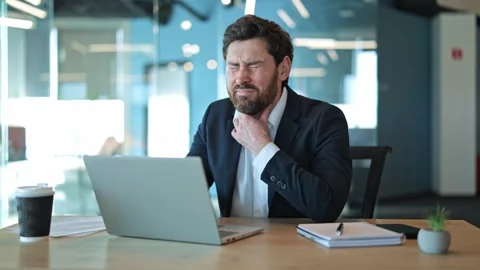Professional Experiences Throat Pain While Working In The Office Stock Footage 329275808