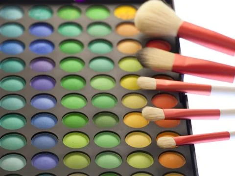 Professional eye shadow close up with brushes on white background Stock Photos