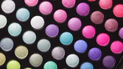 Professional eye shadow palette set. Colorful makeup close up rotating 4k video. Stock Footage 187370897