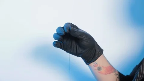 Professional eyebrow prepares thread for eyebrows. Stock Footage 130084368