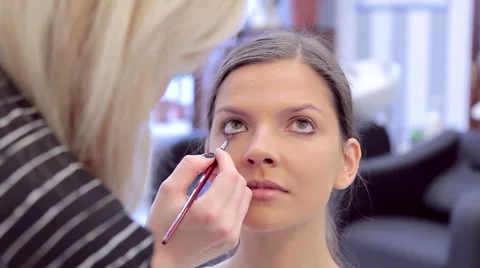 Professional eyes make-up with the eye shadow Video stock 68716546