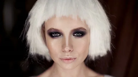 Professional fashion model looking into the camera Stock Footage 60763548