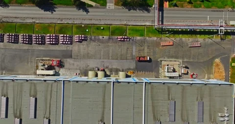 Professional Fast Forklift Operator In Rural Warehouse Sunny Day Aerial High Stock Footage 300445604