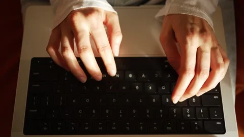 Professional female developer intently working, coding cybersecurity project on Stock Footage 315655147