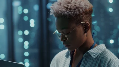 Professional female engineer in database learning technology inspecting server Stock Footage 121224390