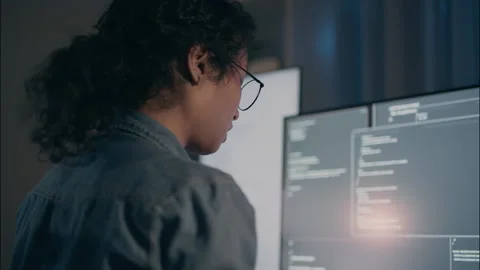 Professional female programmer coding AI and cloud security on computer. Stock Footage 319000870