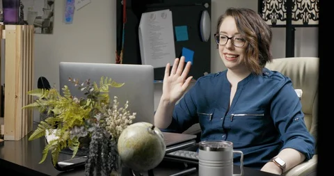 Professional Female Teleconferencing While Working from Home Office Stock Footage 129068237