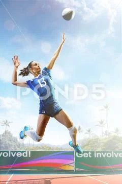 Professional female volleyball player in action on the court Stock Photos