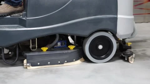 Professional floor cleaning machine washes, does wet cleaning at the enterprise. Video stock 141380893