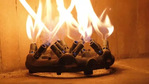 Professional Gas Burner with Multiple Nozzles Ignited Inside a Traditional Itali Video stock 337678427