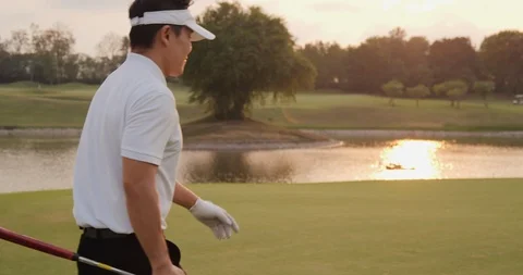 Professional golfer walking on the golf course. 스톡 동영상 103855717