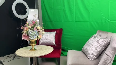 Professional green screen studio with shooting equipment, lights, flowers Stock Footage 246369686