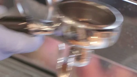 Professional grinding freshly roasted coffee in espresso machine. Barista Stock Footage 80318145