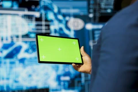 Professional guy in a high tech space uses mockup screen with AI modern tools Foto stock