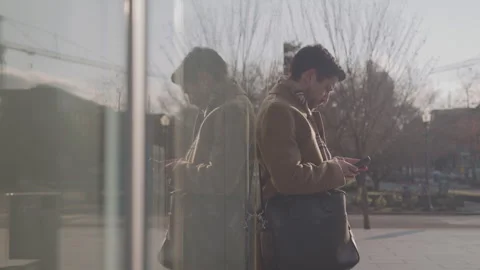 Professional Guy Stops To Text On Phone Stock Footage 270336002