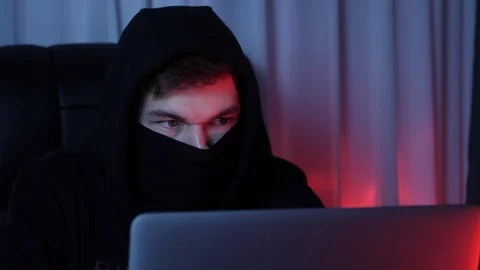 Professional hacker looking at screen and breaking password on computer. Close Video stock 125213972