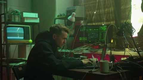 Professional hacker typing on keyboard at night, trying to break password, using Stock-Footage 158623850