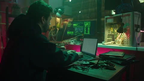 Professional hacker typing on keyboard at night, trying to break password, using Stock-Footage 160494868