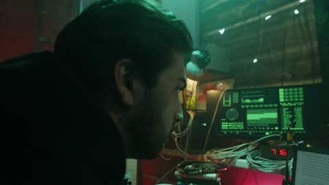 Professional hacker typing on keyboard at night, trying to break password, using Stock-Footage 163679734