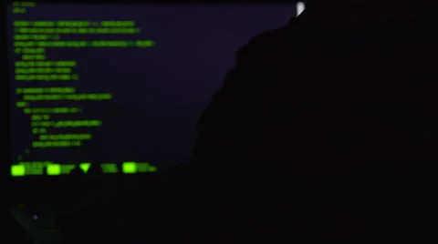 Professional hacker working at night, trying to break into system, cybercrime Stock-Footage 67585585
