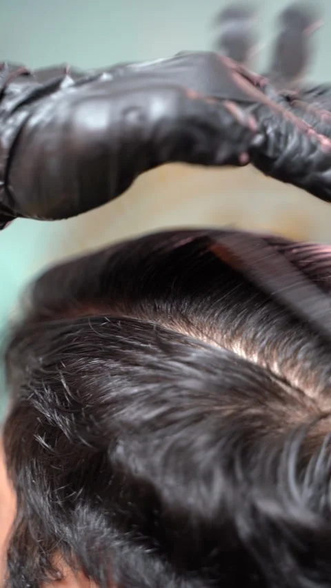 Professional Hair Styling with Flat Iron Stock-Footage 336853192