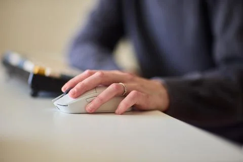Professional hand controls computer, Worker actively managing digital Stock Photos