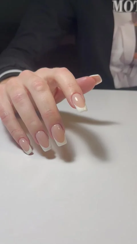 Professional Hand Model Showcasing French Manicure Style Stock Footage 304884521