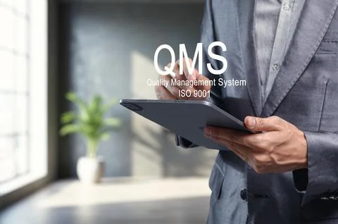 Professional Hands Using Tablet for Quality Management System Concepts 스톡 사진