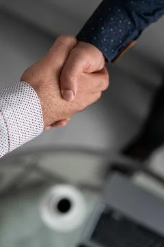 Professional handshake in office environment Stock Photos