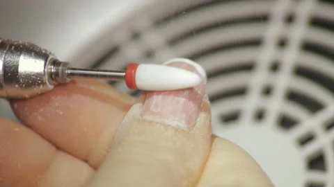 Professional hardware pedicure using electric machine. The manicurist grinded th Stock Footage 101634976