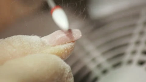 Professional hardware pedicure using electric machine. The manicurist grinded th Stock Footage 101634997