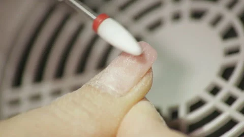 Professional hardware pedicure using electric machine. The manicurist grinded Video stock 101635007