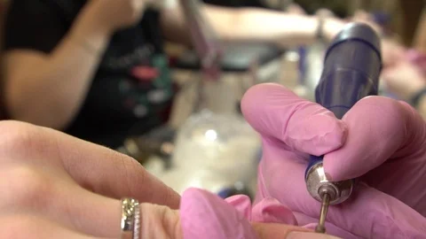 Professional Hardware Pedicure Using Electric Machine. The Manicurist Grinded Stock-Footage 122645181