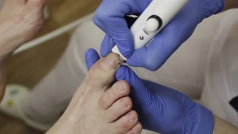 Professional hardware pedicure using an electric device. Stock-Footage 148333490