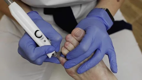 Professional hardware pedicure using an electric device. Stock-Footage 148490284