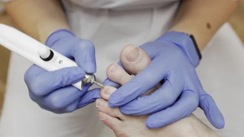 Professional hardware pedicure using an electric device. Stock Footage 148955646