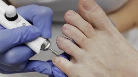Professional hardware pedicure using an electric device. Stock-Footage 149242369