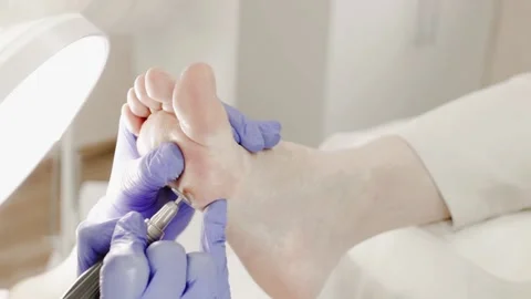 Professional hardware pedicure using an electric device. Stock Footage 149685950