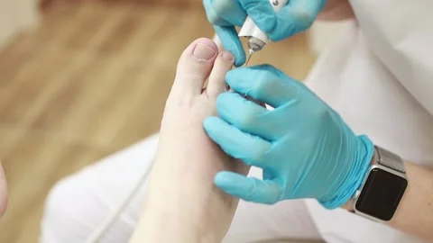 Professional hardware pedicure using an electric device. Stock-Footage 151276843