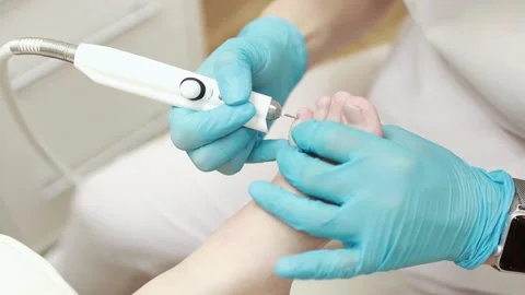 Professional hardware pedicure using an electric device. Stock Footage 151276857