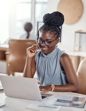 Professional help from the first hello. a young woman using a headset and laptop Stock Photos