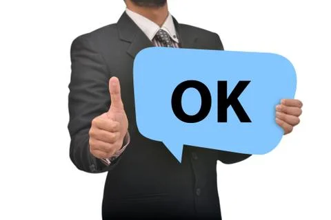 Professional holding Ok Speech Bubble in Hand Stock Photos