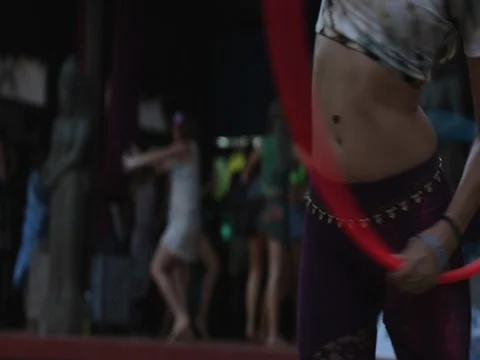 Professional hula hoop dancer performs at artistic party. Stock Footage 70517295