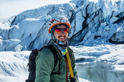 Professional ice climbing guide in front of the icefall of the Matauska Glaci Stock Photos