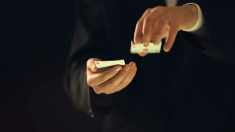 Professional illusionist getting ace of heart from card deck, magic trick show Video stock 104021844
