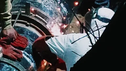 Professional Industrial Worker Welding Large Metal Pipe In Dark Workshop Stock Footage 333493628