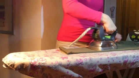 Professional ironing clothes. Stock Footage 106463095