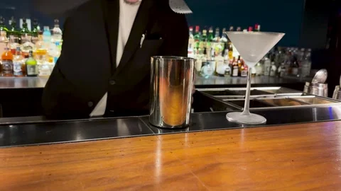 Professional Japanese Bartender Placing Ice Into Metal Shaker at Bar Stock Footage 336225504